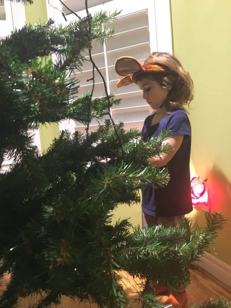 Lulu decorating New Years Tree