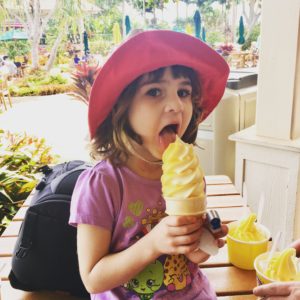 enjoying dole whip on hawaiian family vacation