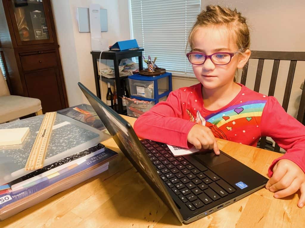 Lulu at her chromebook in remote school